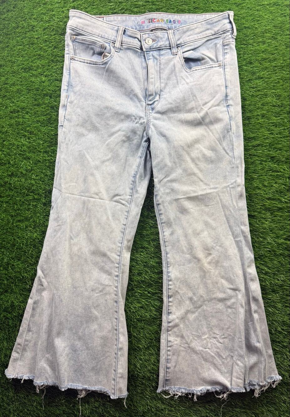 American Eagle Festival Flare Jeans Women's 12 Short Light Wash Stretch Raw Hems